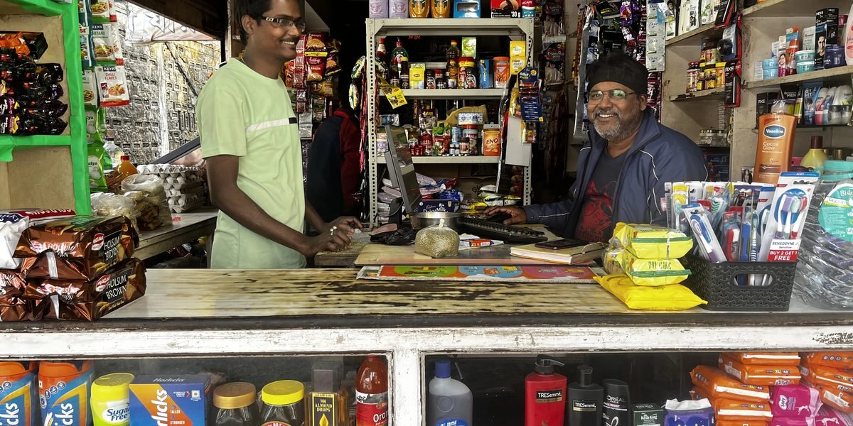 Staff at the Ganapati counter, ready to help customers.